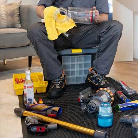 Vacuum cleaner technician